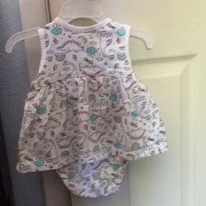 Little cute dress with buttons in the bottom